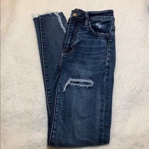 American eagle dark wash ripped jeans.